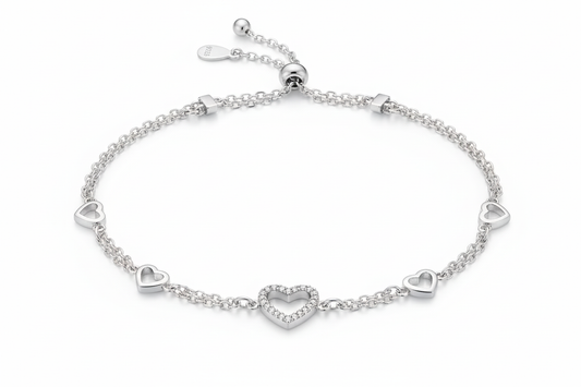 Sterling silver heart charm bracelet white background