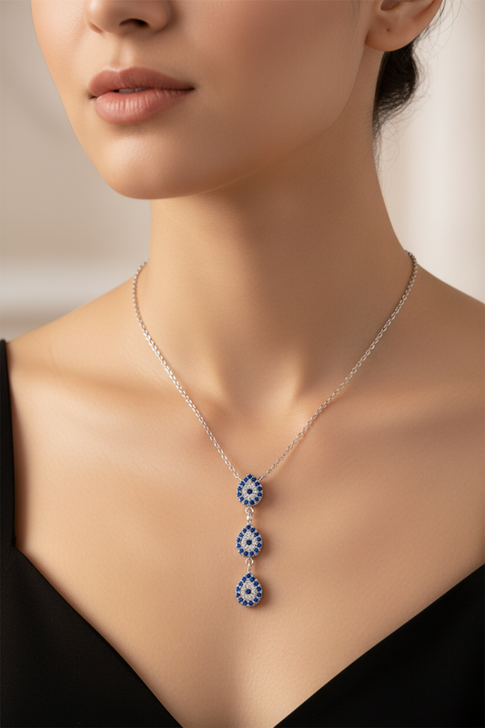 Woman wearing Triple Blue CZ Drop Necklace