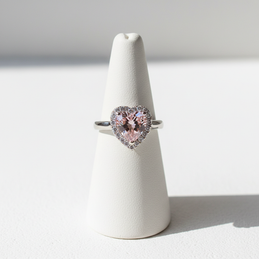 Sterling Silver Pink Heart Halo Ring on ceramic ring stand