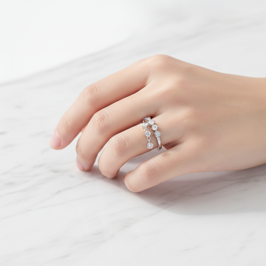 Sterling Silver Ring Worn on Hand with Marble Background