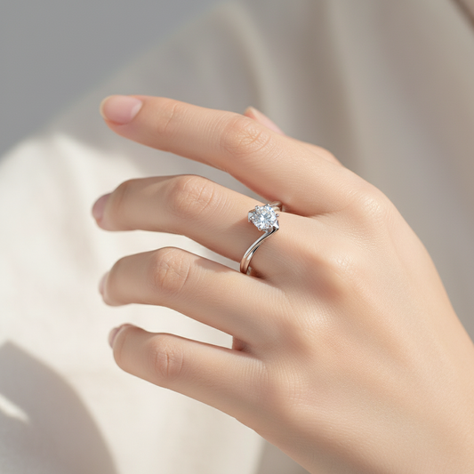 Woman wearing sterling silver solitaire ring